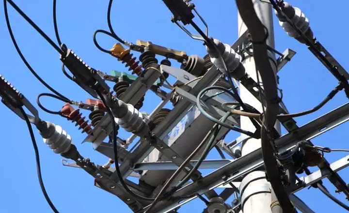 overhead power distribution line with aerial cables